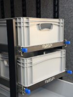 Starflex Euroslider uttrekkssystem montert i vertikalt skinnesett for flere nivåer